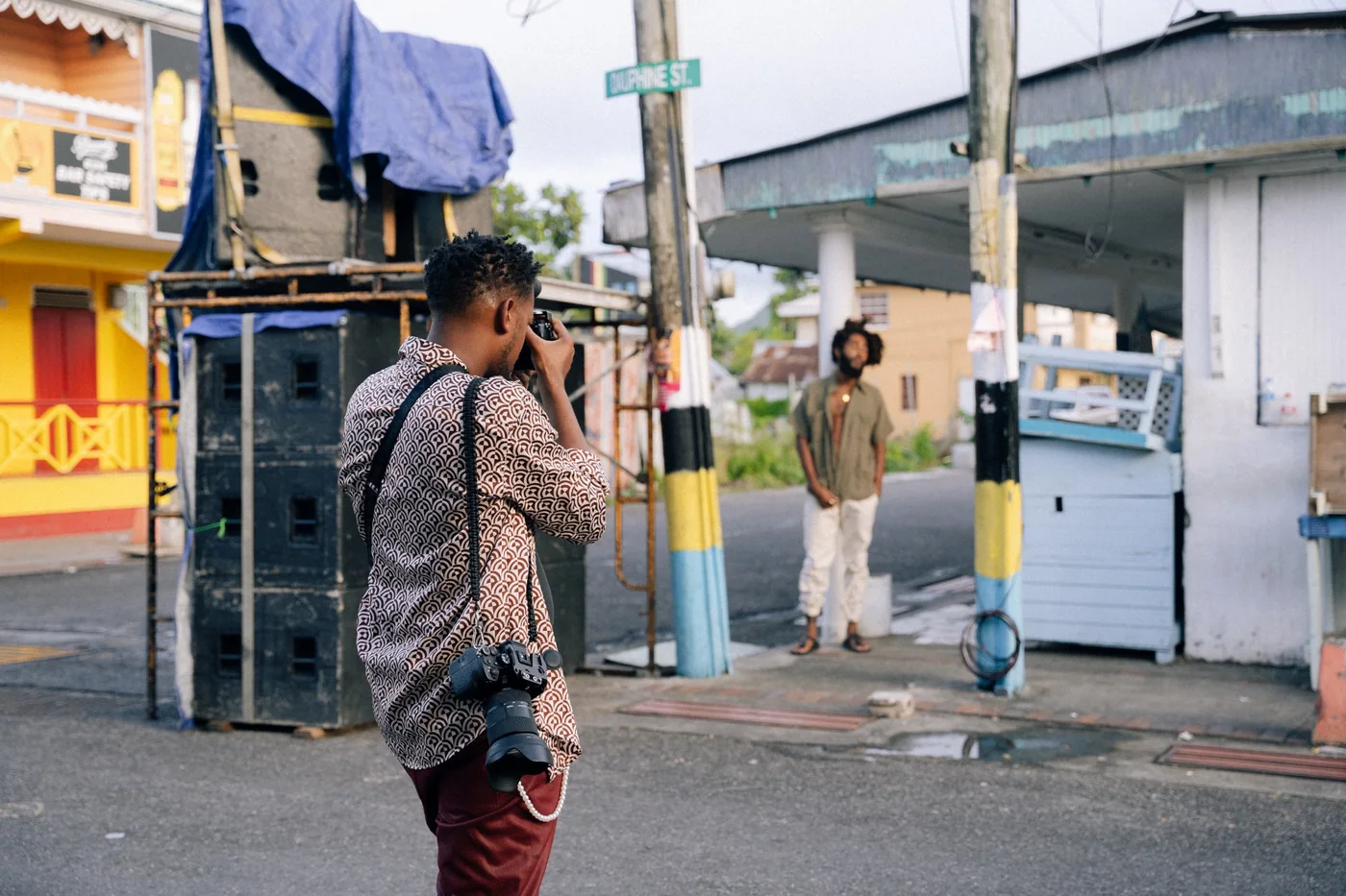 A photographer creating a portrait on a Saint Lucian street